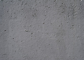 Texture of old wall covered with gray stucco