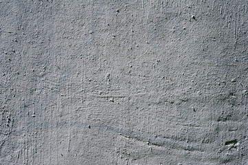 Texture of old wall covered with gray stucco