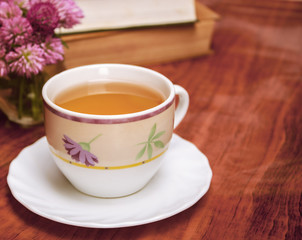 Fototapeta na wymiar cup of hot tea in cold weather