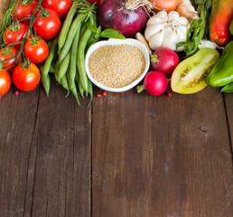 CousCous in a bowl and fresh vegetables