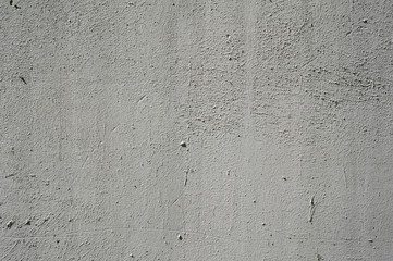 Texture of old wall covered with gray stucco