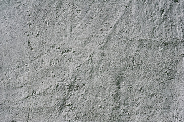 Texture of old wall covered with gray stucco