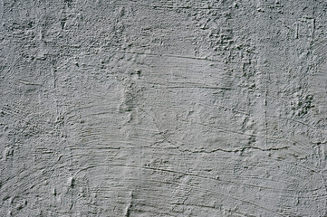 Texture of old wall covered with gray stucco