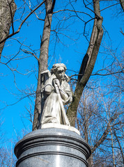 Old cemetery angel with broken face