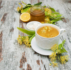 cup of herbal tea with linden flowers