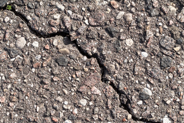 Old worn and cracked asphalt