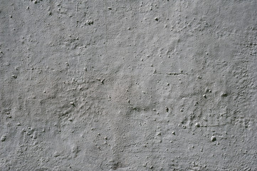 Texture of old wall covered with gray stucco