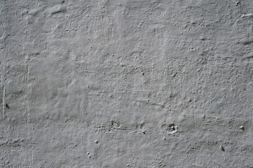 Texture of old wall covered with gray stucco