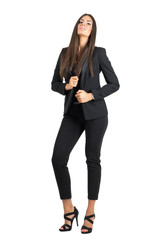 Fototapeta premium Seductive elegant beauty in black suit holding collar with head leaned back