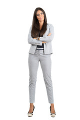 Confident strong business woman with folded arms looking at camera isolated