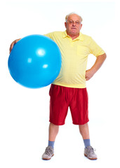 Elderly man with exercise ball.