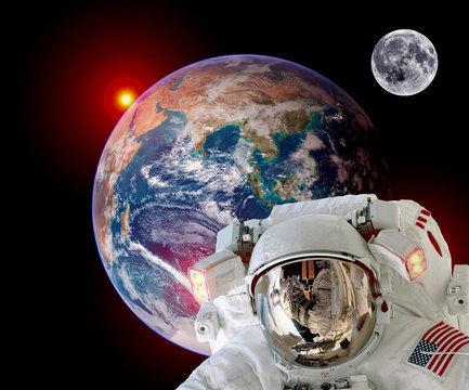 Astronaut spaceman isolated helmet outer space earth satellite moon sun. Elements of this image furnished by NASA.