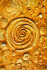 Grunge flowers, abstract background the color of dark wood or rich soil, rustic, made of clay pigment and raw umber, sienna, 3d, three dimensional grunge embossing and carving.