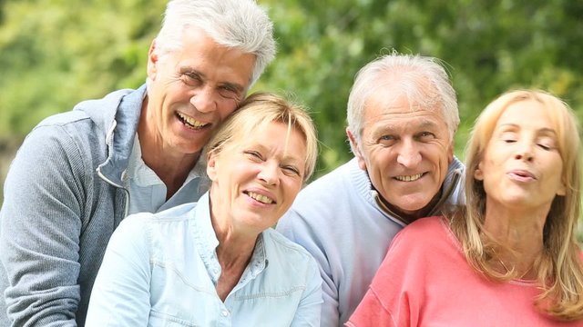Senior couples having a good time in countryside