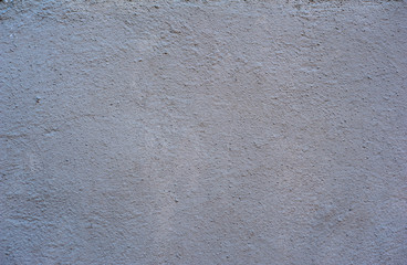 Texture of old wall covered with gray stucco