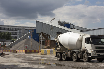 Cement Plant,Concrete or cement factory, white cement mixer in the foreground