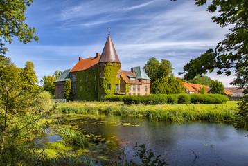 Fototapeta premium Ortofta castle and moat