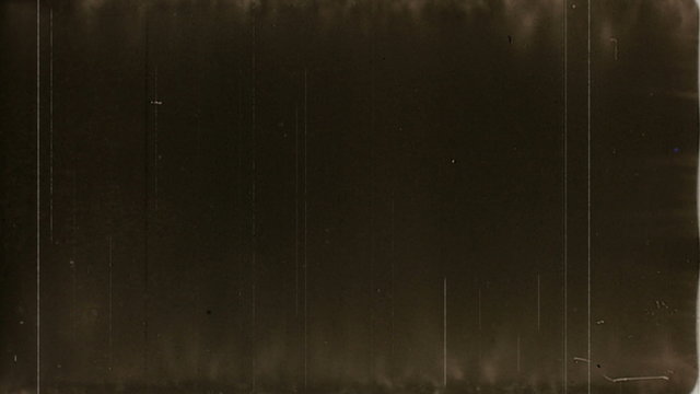 Flicker 010: Countdown on scratched, damaged, retro, black and white film leader.