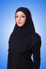 Muslim young woman wearing hijab on white