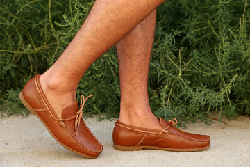 Naklejka premium Fashion leather and brown moccasins shoes