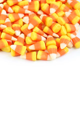 Halloween candy corns on white background