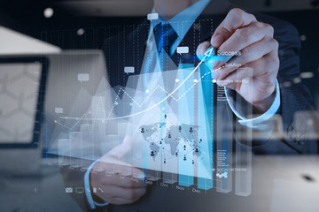 businessman hand working with new modern computer and business s