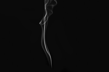 White smoke on black background