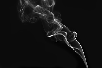 White smoke on black background