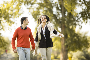 Young couple in the autumn park