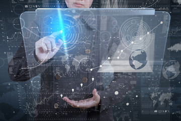 businessman hand working with modern technology and digital laye