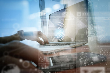 businessman hand working with modern technology and digital laye