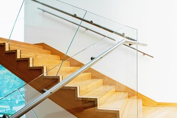 Modern interior with wooden stairs
