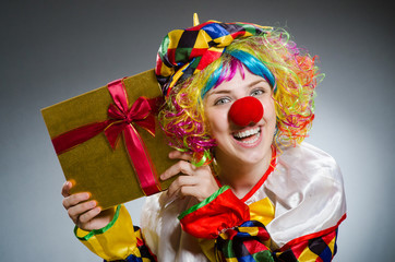 Funny clown in comical concept