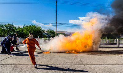 Firefighter fighting fire during training