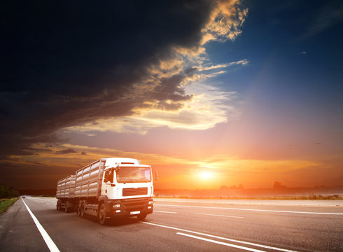 Modern Semi Truck in Motion. American Highway Trucking