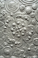 Metal flower plate, made of steel floral background. High resolution silver decorative texture surface, metallic powder spray, acrylic art work, painting.