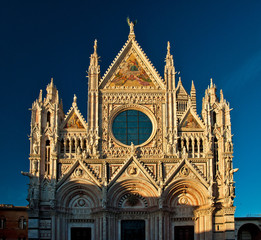 Fototapeta na wymiar Siena Cathedral, dedicated to the Assumption of the Blessed Virgin Mary. Siena. Italy
