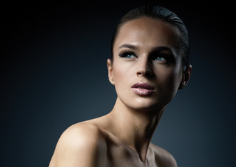 Portrait of beautiful woman with nude make-up