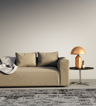 Beige contemporary modern sofa with gold table lamp