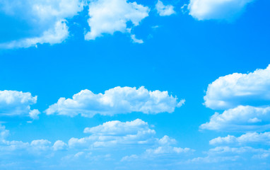 blue sky background with tiny clouds