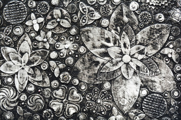 Flowers, abstract grunge surface, black and white composition made of paint layers. Unique technique painting.  3d, embossing  and carving,  Imitation of dirty surface. Highly textured background.