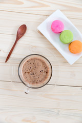 Macaroons with a cup of coffee