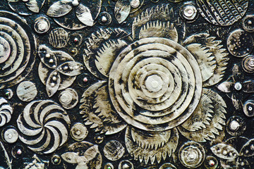 Fototapeta na wymiar Flowers, abstract grunge surface, black and white composition made of paint layers. Unique technique painting. 3d, embossing and carving, Imitation of dirty surface. Highly textured background.