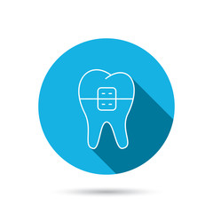 Dental braces icon. Tooth healthcare sign.