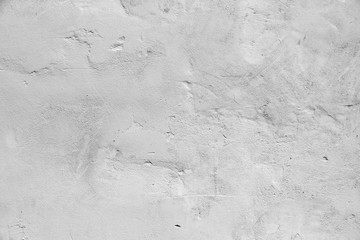 Gray concrete wall with relief details, background