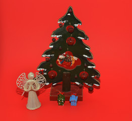 Christmas toys at red background
