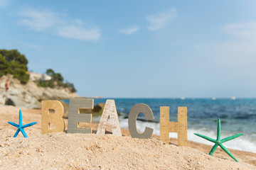 Vintage letters at the beach