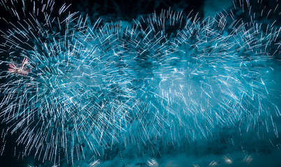 Blue fireworks on the night sky