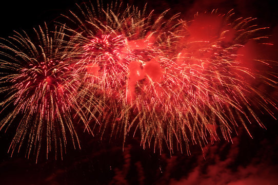 Red fireworks on the night sky