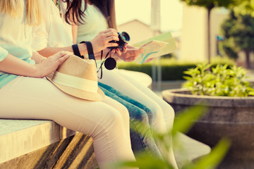 Three attractive tourist girlfriends